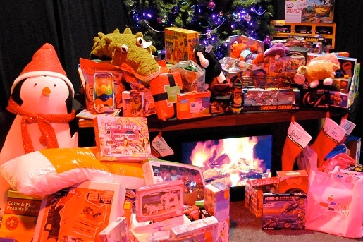 Part of the mountain of toys donated to Summit County Children's Services at Santafest.