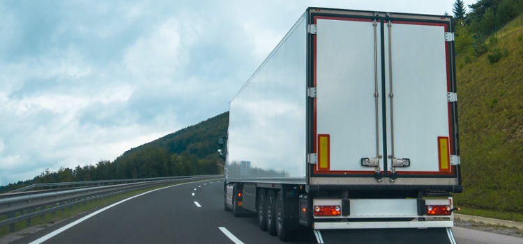 Rear view of a semi truck on the highway-1