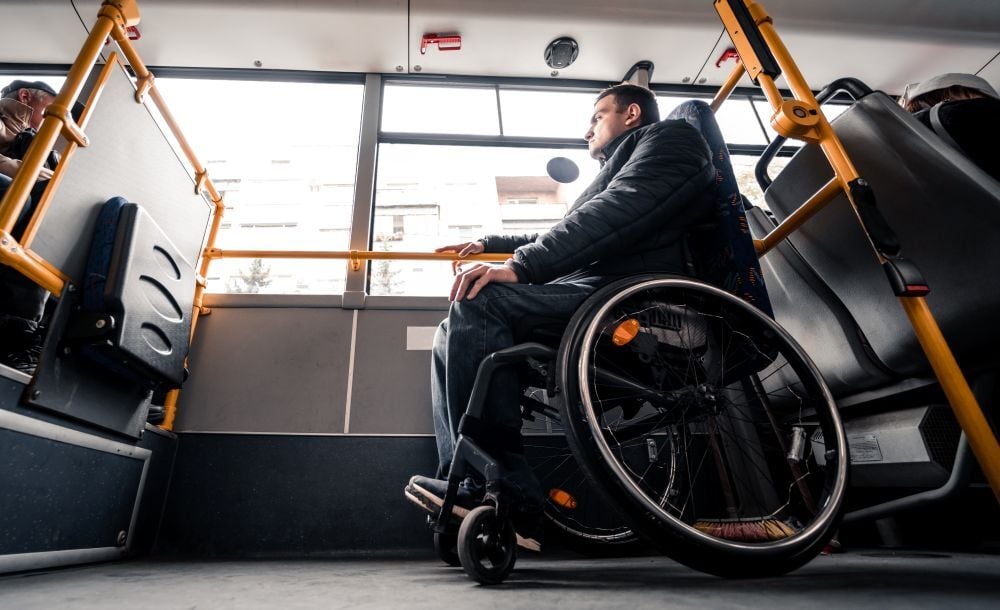 mobility device securement happening on a transit or motorcoach