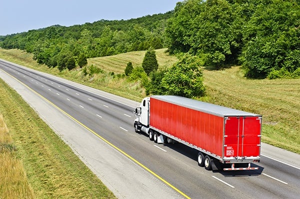 Red Semi Truck On Interstate Highway