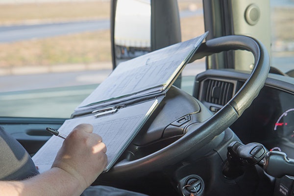 safety director truck driver writing