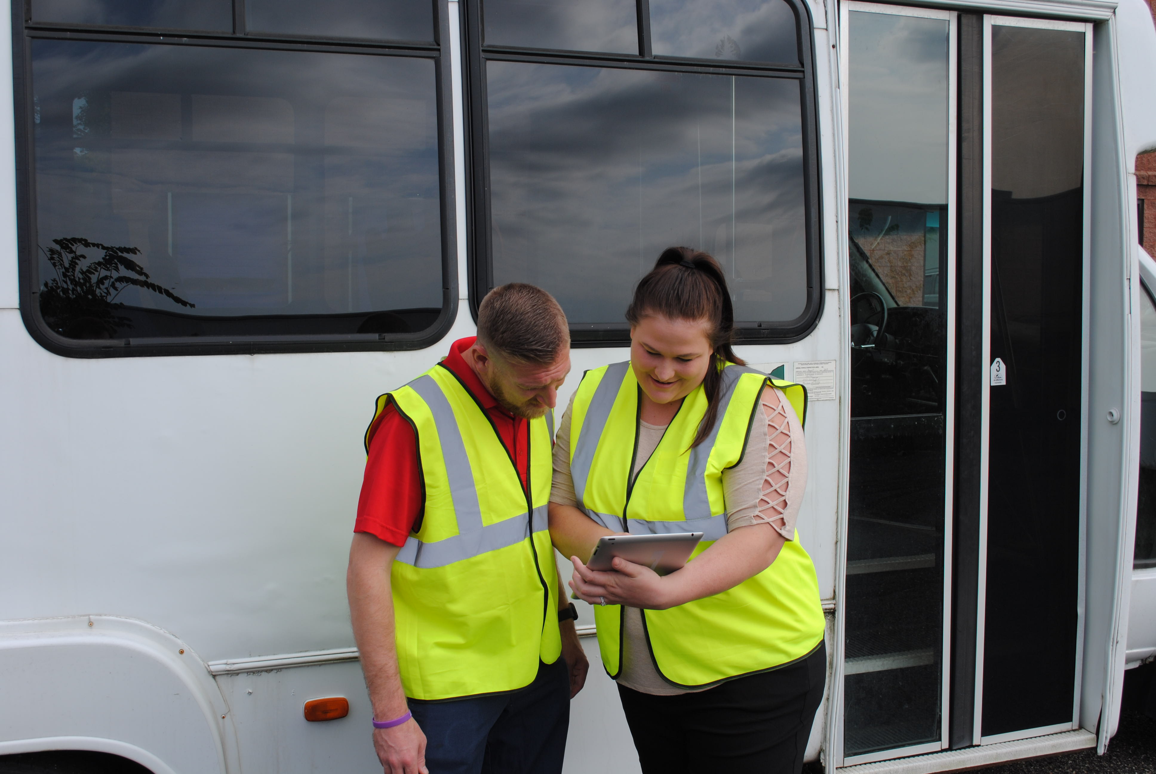 instructor and trainee with tablet